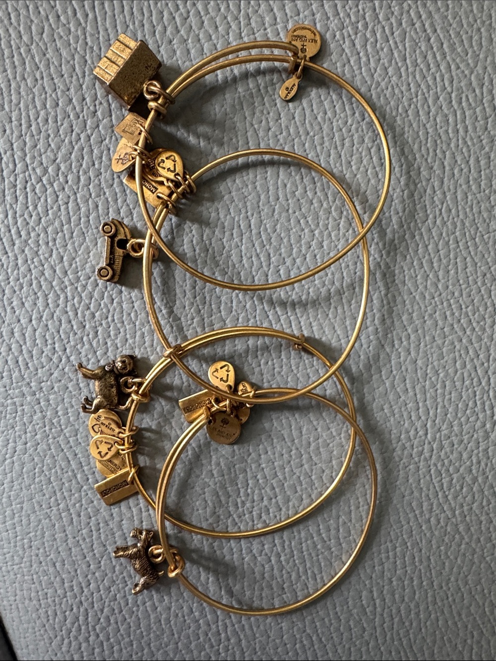 ALEX AND ANI MONOPOLY HASBRO GOLD TONE CHARM BANGLE BRACELET 4 DOG CAT CAR HOUSE